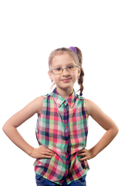Little cute girl in glasses posing on a white background. Child with poor vision - 写真・画像