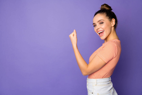 Profile side view portrait of her she nice-looking attractive lovely cheerful cheery girl celebrating luck isolated on bright vivid shine vibrant lilac violet purple color background - Photo, image