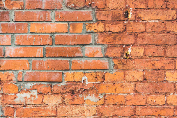 Old brick wall, old texture of red stone blocks closeup - 写真・画像