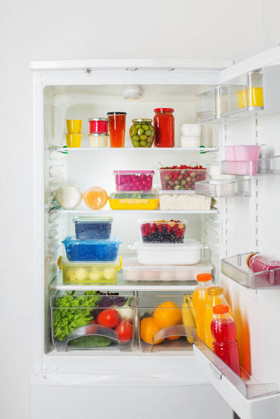 refrigerator with different healthy food - Фото, зображення