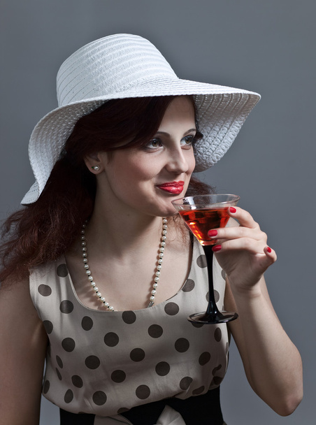 young woman with martini - 写真・画像