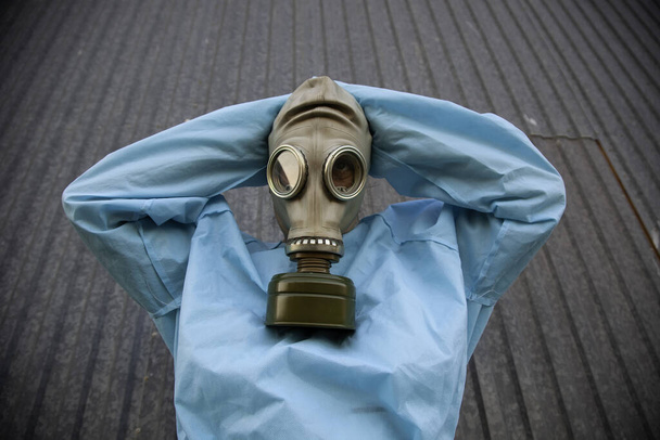Gas mask for pandemic, covid and anthrax, bacteriological warfare, medical nurse - Photo, Image