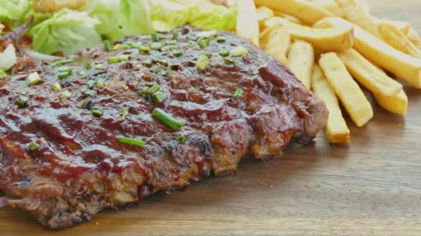 delicious grilled beef steak with vegetables and French fries - Footage, Video