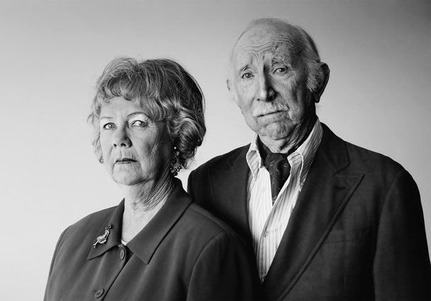 Snooty Senior Couple with Strong Woman - 写真・画像