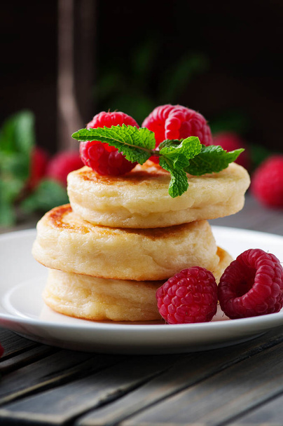 Cottage cheese pancakes, homemade traditional Ukrainian and Russian syrniki, selective focus - Foto, immagini