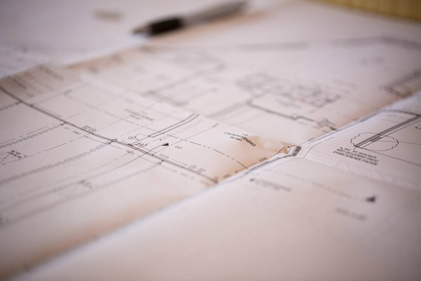 Closeup of blueprints on a table - Photo, Image
