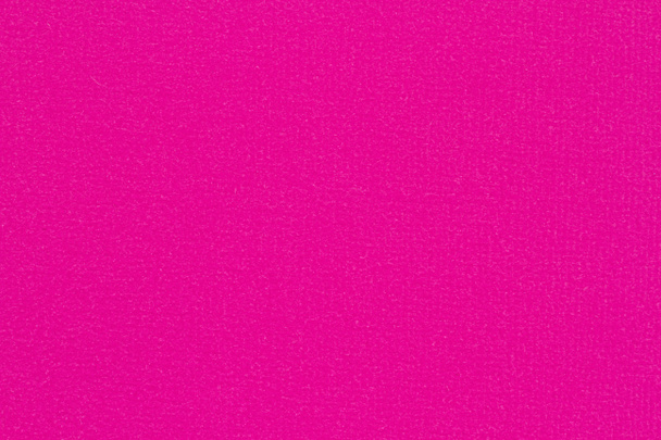 Горячая розовая текстурированная бумага крупным планом фон с копировальным местом для сообщения или использовать в качестве текстуры  - Фото, изображение
