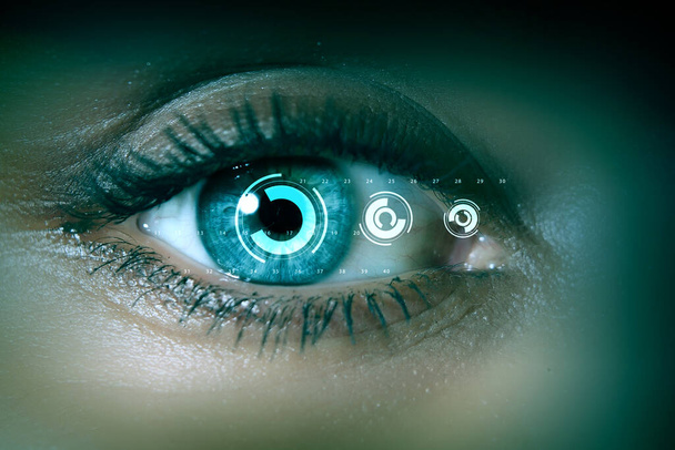 Close up of woman eye in process of scanning - Φωτογραφία, εικόνα