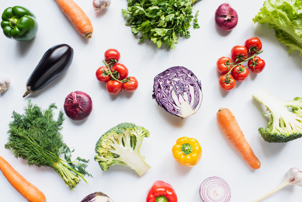 top view of colorful assorted fresh vegetables on white background - Valokuva, kuva