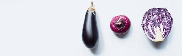 flat lay with red onion, red cabbage, eggplant on white background, panoramic shot - Fotoğraf, Görsel