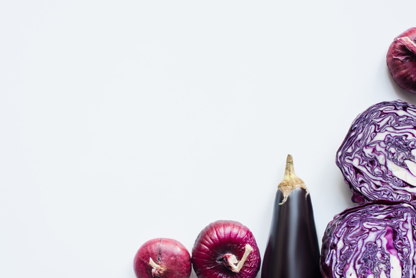top view of red onion, red cabbage, eggplant on white background - Fotografie, Obrázek