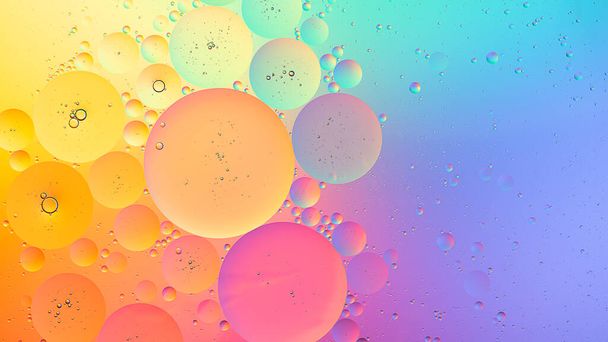 Abstract colorful macro background of oil droplets on water - Photo, image