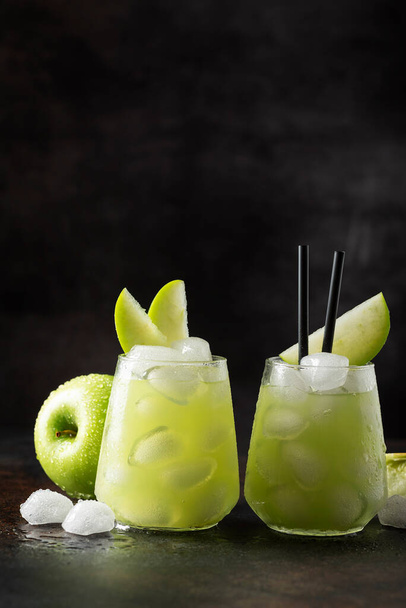 Summer cocktail with green apple and ice. Selective focus image with copy space - Fotoğraf, Görsel