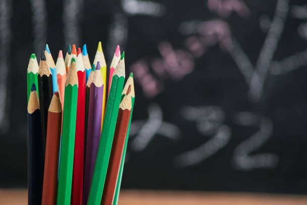 multicolored pencils on the background school board, school, university, college - Fotografie, Obrázek