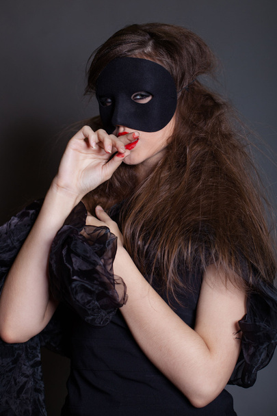 Portrait of a woman in a mask - Photo, Image