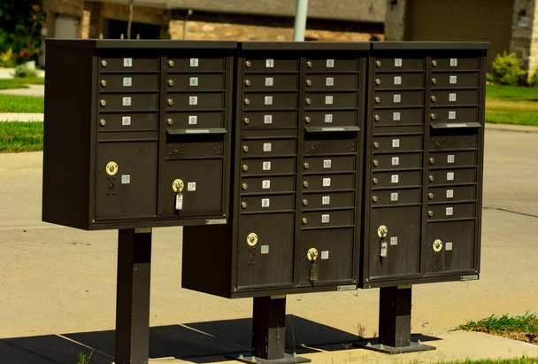 A row of mailboxes for a subdivision in Conroe, TX. - Photo, Image