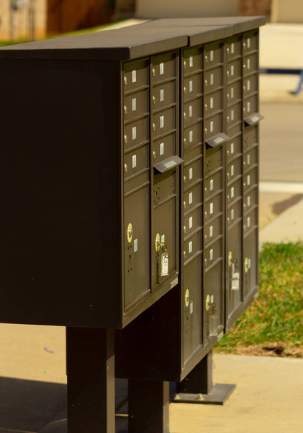 A row of mailboxes for a subdivision in Conroe, TX. - Photo, Image