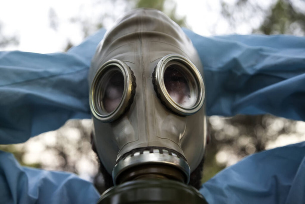 Gas mask for pandemic, covid and anthrax, bacteriological warfare, medical nurse - Photo, Image