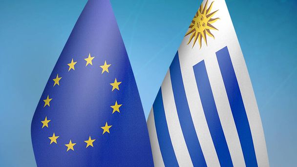 Euroopan unioni ja Uruguay kaksi lippua yhdessä sininen tausta - Valokuva, kuva