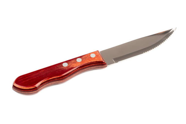 Couteau de cuisine avec manche en bois isolé sur fond blanc. - Photo, image