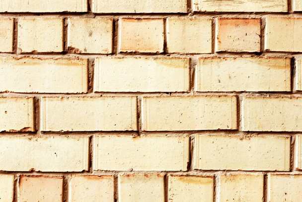 yellow brick background, the wall of the building is a large plan, built in Panev ys in 1978 - Foto, imagen