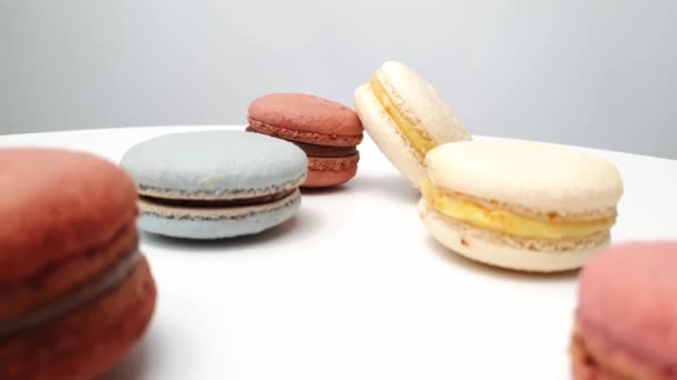 macarons from natural ingredients and dyes on white table. - Footage, Video