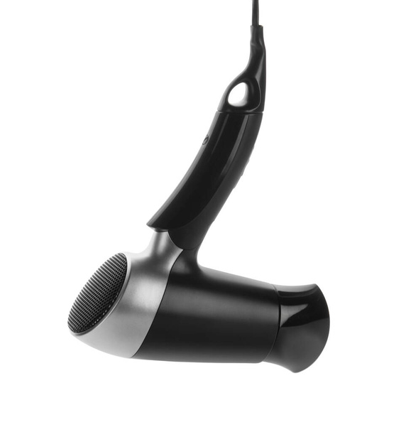 Modern hair dryer isolated on white. Professional hairdresser tool - Fotó, kép