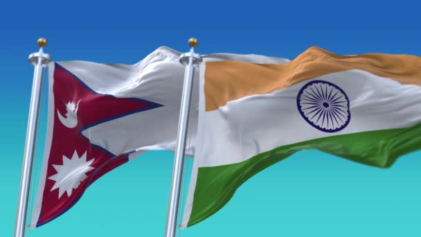 4k bezešvé Indie a Nepál vlajky s modrým nebem pozadí, JP, IND. - Záběry, video