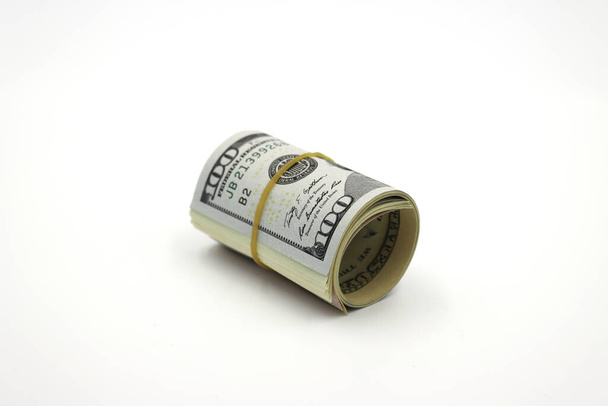 Money. Roll of dollars isolated on white background. - Photo, Image