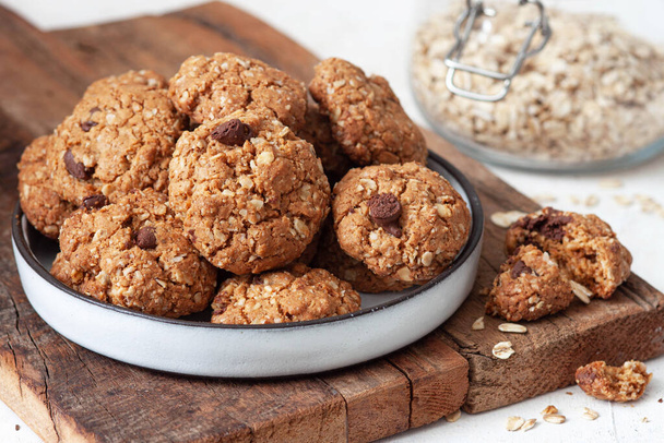 Homemade oatmeal cookies on wooden board.Healthy Food - Photo, Image