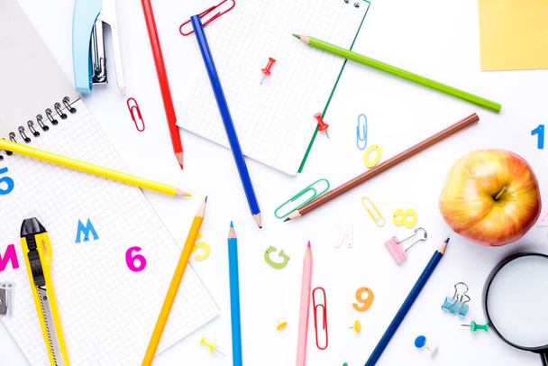 Many different school supplies on white copy space background. Back to school concept. - Photo, Image