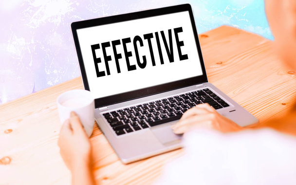 Conceptual hand writing showing Effective. Business photo text equal to the rate of simple interest that yields the same amount Modern gadgets white screen under colorful bokeh background. - Photo, Image