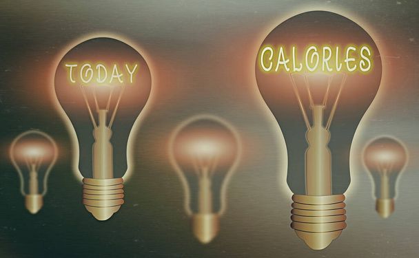 Conceptual hand writing showing Calories. Business photo showcasing an amount of food having a value of the energy of one large calorie Realistic colored vintage light bulbs, idea sign solution. - Photo, Image