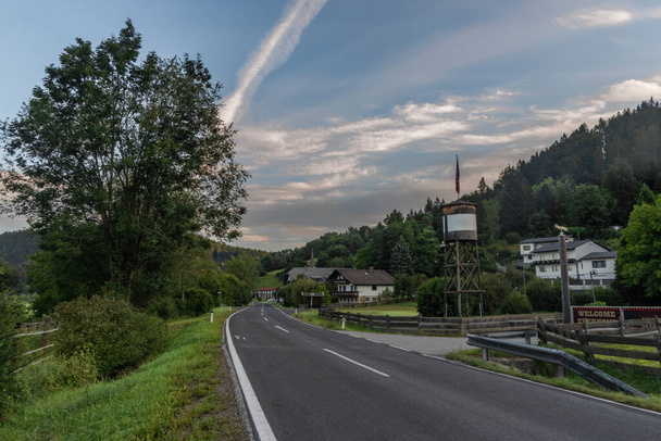 Main road in Oberferlach village in south Austria in summer fresh morning - Foto, imagen