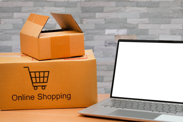 Online shopping with computer laptop for small business SME at home. online business and E-commerce. - Foto, imagen