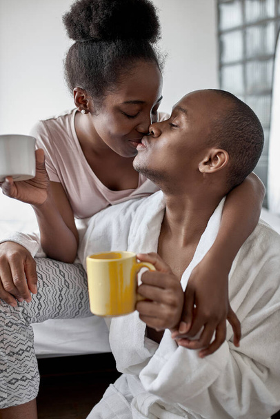 portrait of cute african couple in bedroom - Photo, image