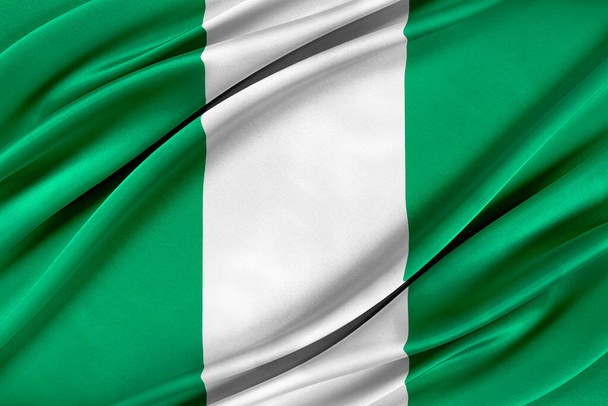 Colorful Nigeria flag waving in the wind. - Photo, Image