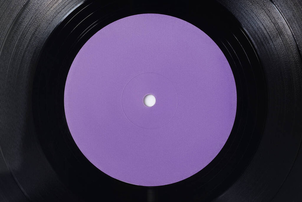 Violette blank label of LP vinyl record. Close-up shot, top view. - Photo, Image