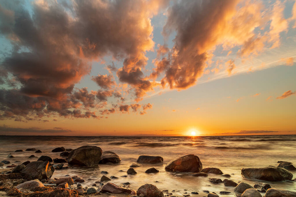 Sunset by the sea. Nature and nature landscape at sunset. - Photo, Image