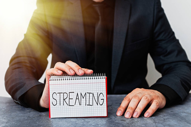 Conceptual hand writing showing Streaming. Business photo text process, or an instance of streaming data or accessing data Model displaying different color notepad mock-up for writing idea. - Foto, Bild