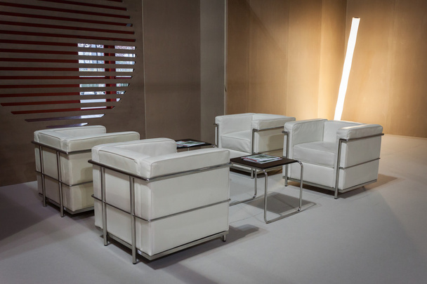 Empty armchairs in the buyers lounge at HOMI, home international show in Milan, Italy - Photo, image