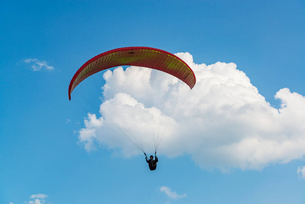 2017-06-25, Kyiv, Ukraine. Paraglider wing in the sky with clouds - Fotoğraf, Görsel
