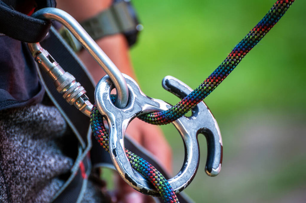 Climbing sports image of a carabiner on a rope close-up. - Foto, Imagem