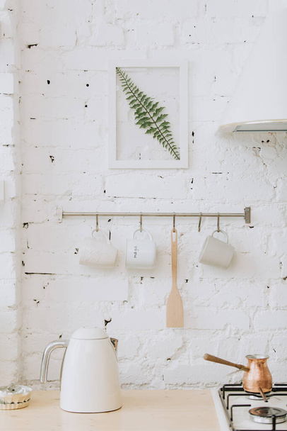 Vintage style white kitchen with kettle - Foto, imagen