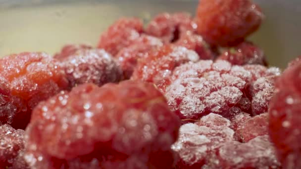 The camera moves through frozen raspberries - Footage, Video