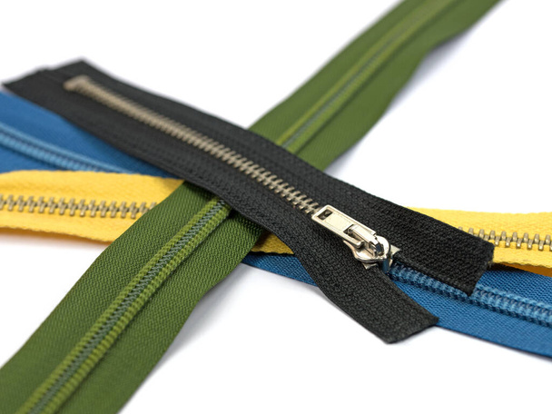 Colorful zippers against white background - Photo, Image