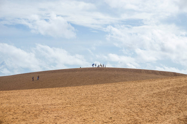 Red Sand Dunes (local name is Doi Cat Do), also known as Golden Sand Dunes, is located near Hon Rom beach, Mui Ne, Phan Thiet city. This is an attractive tourist destination in Mui Ne. - Photo, Image