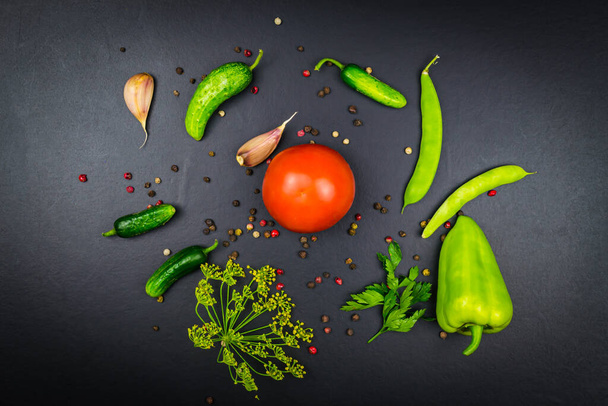 Top view peppers, cucumbers, beans, tomato garlic dill Black background - Фото, изображение