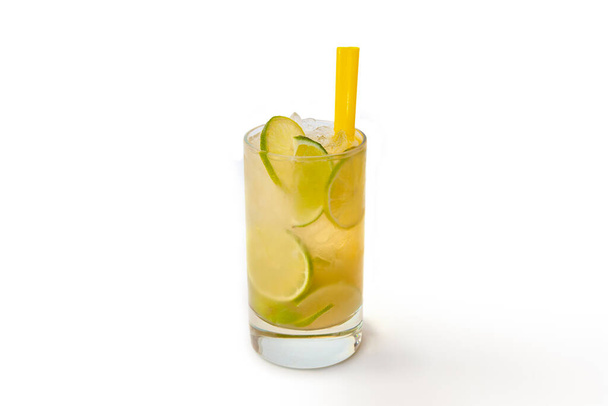 Mojito cocktail with fresh limes on white background - Valokuva, kuva