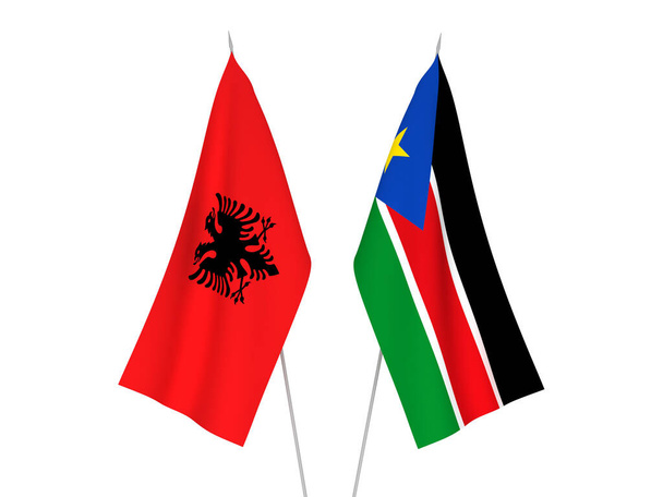 南スーダン共和国とアルバニア共和国の国旗が白地に隔離されている。3Dレンダリング図. - 写真・画像